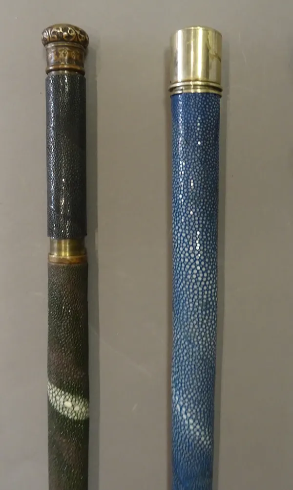 A Victorian and later blue shagreen covered gadget walking cane, with twist top opening to reveal a long glass thermometer (87cm) and another green sh