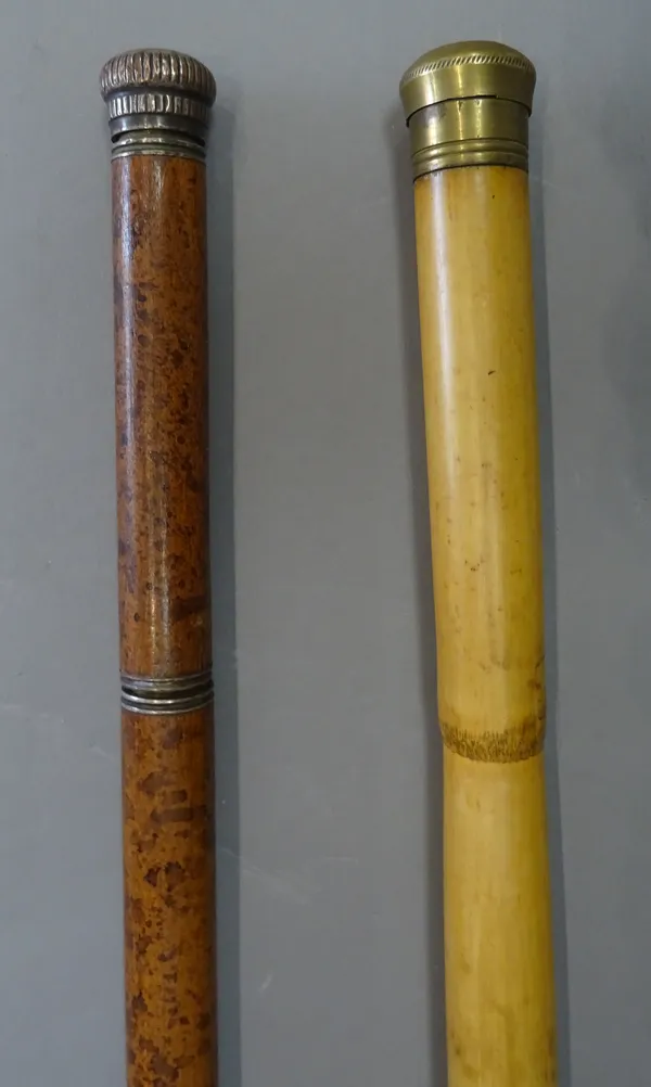 A bamboo and brass mounted 'fishing rod' gadget cane of three sections, early 20th century, with brass screw cap (90cm) and one further Victorian gadg
