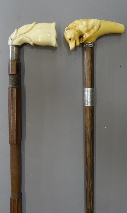A Black Forest ivory and silver mounted walking cane, late 19th century, the bear carved handle over a silver collar, hallmarked London 1871 (89cm) an