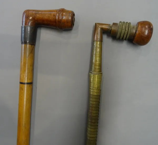 A Victorian 'pipe' gadget walking cane, with walnut bowl and concealed mouthpiece (88cm) and another wire bound 'pipe' walking stick with burr walnut