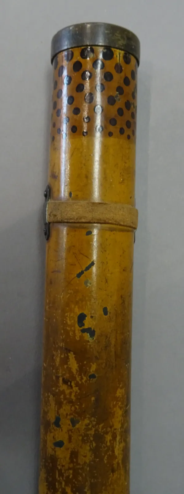 A gadget 'telescope' walking cane, late 19th century, tole peinte, of sectional form, enclosing a single drawer telescope, 90.5cm.