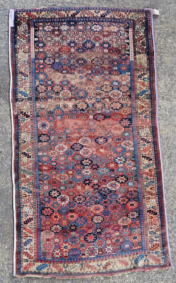 A Turkeman rug, the repeating horizontal bands with flattened gul design, 256cm x 136cm and another with allover octagonal gul design, 259cm x 138.5cm