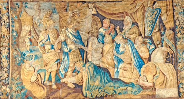 A Flemish mythological tapestry 17th century depicting two generals attending the Birth of a child, incomplete approx 412cm x 223cm.  Illustrated