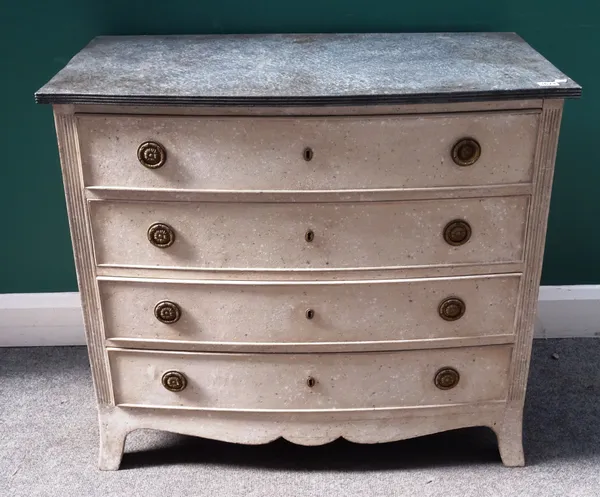 A painted bowfront chest of drawers, the faux slate top over four long graduated distressed white painted drawers, on splayed bracket feet, 89cm wide