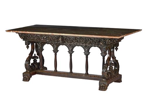 A Victorian centre table, the rectangular marble top on a carved oak two drawer base with double opposing scroll supports on paw feet, 180cm wide x 75