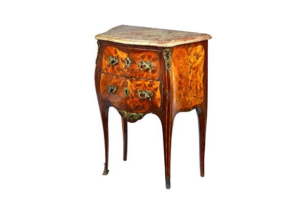 A Louis XV ormolu mounted marquetry inlaid kingwood and tulipwood petite commode, the serpentine pink marble top over a bombé two drawer base, on slen