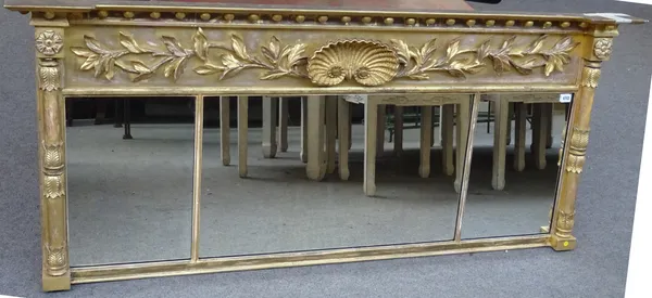 A William IV gilt framed overmantel mirror with shell and ball inverted breakfront frieze over triple mirror plate, 165cm wide x 71cm high.