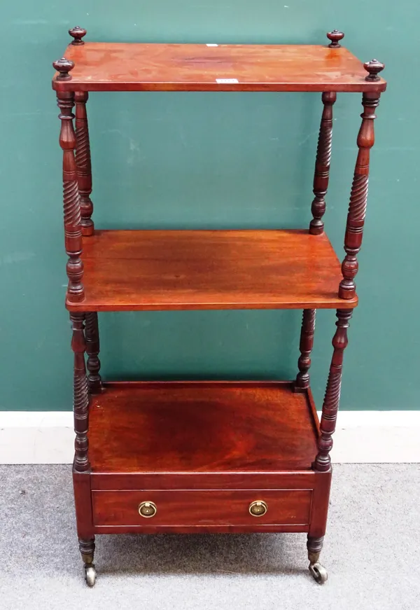 A mid-19th century mahogany three tier whatnot with single drawer base and spiral fluted supports, 51cm wide x 106cm high x 33cm deep.