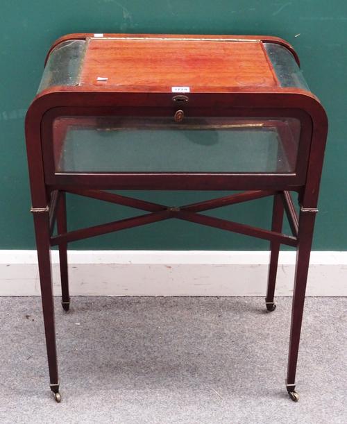 A late 19th century gilt metal mounted mahogany vertu table on  tapering square supports united by X frame stretcher, 58cm wide x 79cm high x 37cm dee