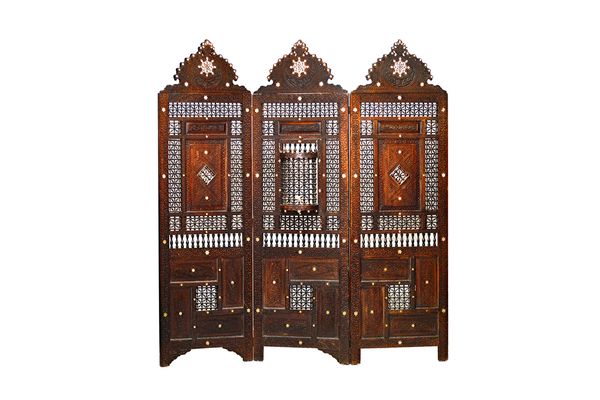 A late 19th North African mother-of-pearl inlaid carved hardwood and bobbin turned three fold screen with integral small door, 180cm wide x 192cm high