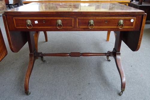 A Regency satinwood banded mahogany two drawer sofa table on four downswept supports, 95cm across x 152cm across open x 75cm high x 66cm deep.