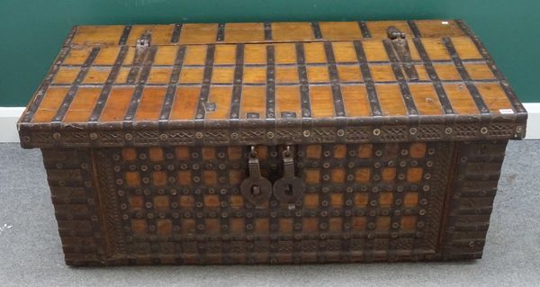 A 19th century Indian iron bound teak rectangular trunk, 132cm wide x 50cm high x 70cm deep.