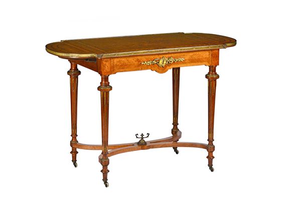 A Victorian marquetry inlaid gilt metal mounted drop flap centre table on tapering fluted supports united by X frame structure, 80cm across x 115cm ac