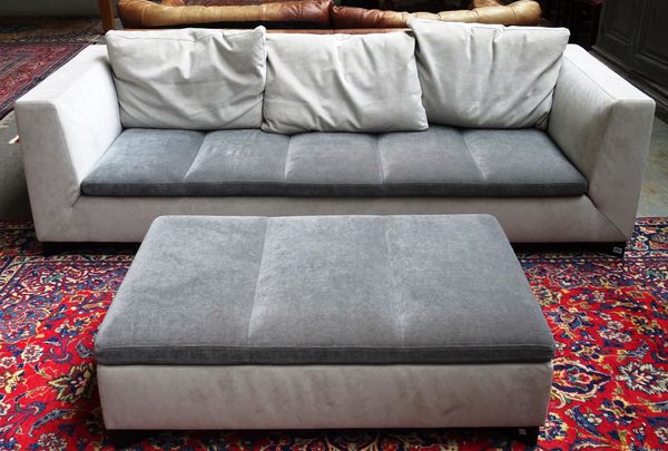 LIGNE ROSET; a 20th century grey suede upholstered square back sofa, on ebonised supports, 230cm wide x 66cm high, together with a matching rectangula