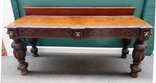 A Victorian carved oak serving table, with a pair of frieze drawers, on bulbous supports, stamped JAS WINTER & SON 101 WARDOUR ST SOHO LONDON, 213cm w