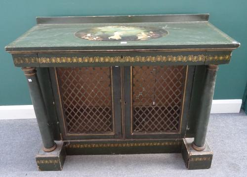 A 19th century pine side cabinet with fitted frieze drawer over pair of grille doors flanked by turned columns, later painted with 18th century scenes