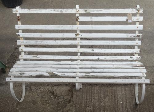 An early 20th century white painted wrought iron garden bench, with slatted wooden seat, 212cm wide x 81cm high, together with another similar 153cm w