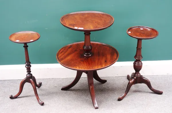 A George III mahogany graduated circular two tier dumb waiter on tripod base, 50cm diameter x 65cm high, together with two 18th century style mahogany