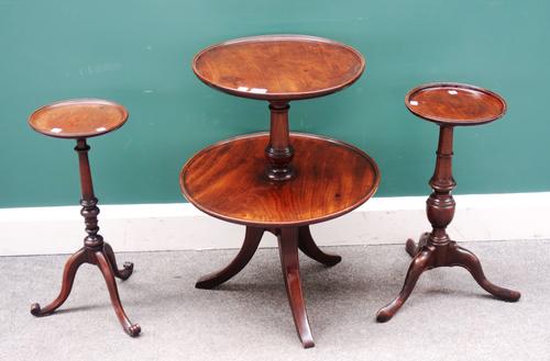 A George III mahogany graduated circular two tier dumb waiter on tripod base, 50cm diameter x 65cm high, together with two 18th century style mahogany