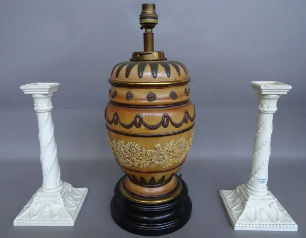 A Doulton stoneware oil lamp base (converted) decorated with foliate bands against a buff coloured ground (32cm high);  and a pair of  Royal Worcester