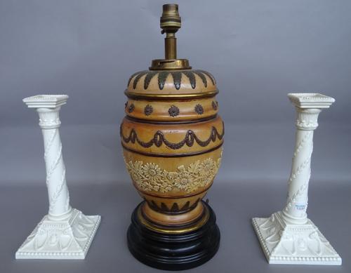 A Doulton stoneware oil lamp base (converted) decorated with foliate bands against a buff coloured ground (32cm high);  and a pair of  Royal Worcester
