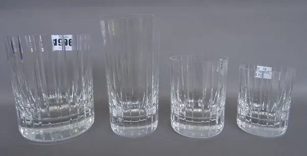 A Baccarat part suite of crystal decorated in the 'Harmonie' pattern comprising; seven high ball glasses (14cm high), three tumblers (12cm high), two