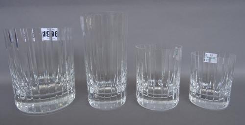 A Baccarat part suite of crystal decorated in the 'Harmonie' pattern comprising; seven high ball glasses (14cm high), three tumblers (12cm high), two