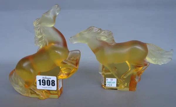 A Lalique crystal cachet cheval Or (seal horse gold) etched mark to base (11cm high); and another Lalique amber glass horse in differing pose, also wi