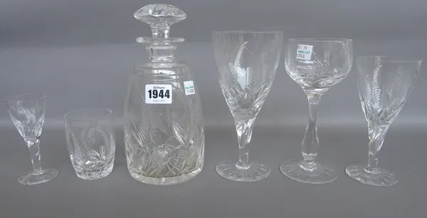 A Royal Stuart 'Fern' pattern part suite of lead crystal stemware comprising; decanter and stopper, six red wine glasses, six white wine glasses, six