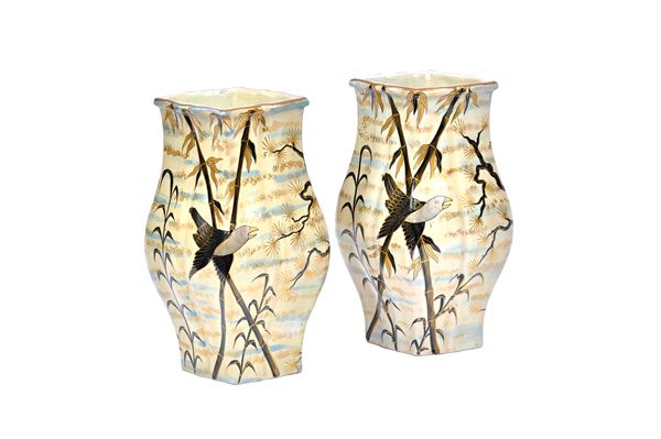 A pair of Gallé faience vases, circa 1900, painted with birds in branches,each inscribed in black, E.Gallé a Nancy,  22cm. high. Illustrated