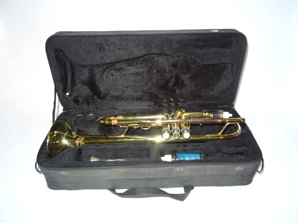 Musical instruments, comprising; a Bach Prelude Trumpet, cased.   S2T