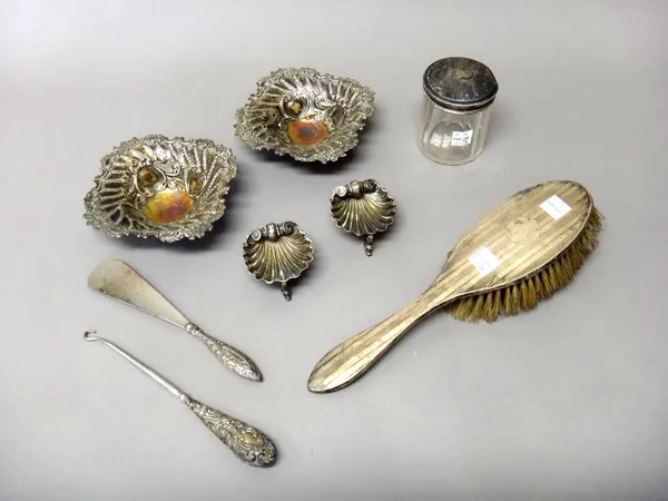 Silver and silver mounted wares, comprising; a pair of Victorian bonbon dishes, with embossed decoration, raised on spherical feet, Birmingham 1897, a