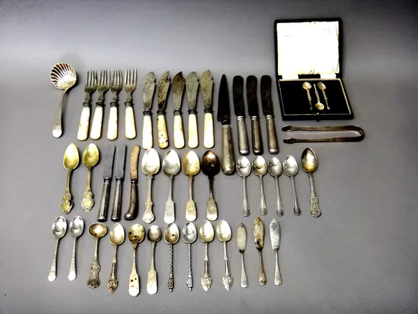 Silver flatware, comprising; an Old English and shell pattern sauce ladle, with engraved decoration, probably London 1792, a pair of sugar tongs by Pe