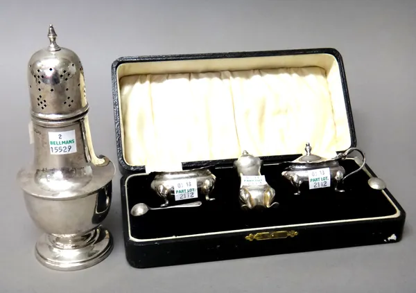 A silver sugar caster, of baluster form, Sheffield 1946, a silver salt spoon, Birmingham 1927, combined weight 128 gms and a plated part condiment set