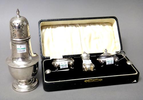 A silver sugar caster, of baluster form, Sheffield 1946, a silver salt spoon, Birmingham 1927, combined weight 128 gms and a plated part condiment set
