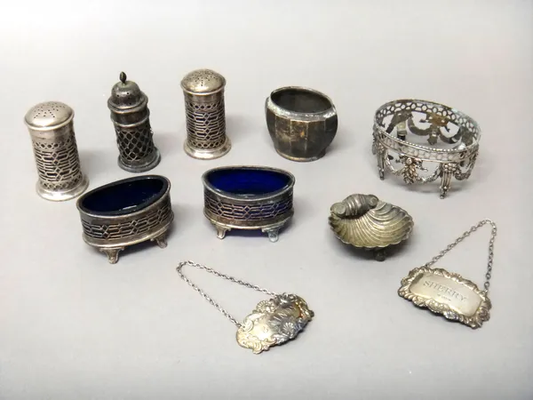 Silver and silver mounted wares, comprising; a pair of oval salts, with pierced decoration, with blue glass liners, a pair of pepperettes, another pep