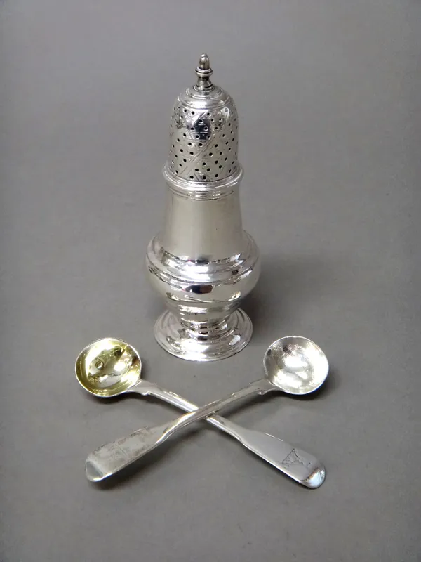 Silver, comprising; a George III baluster shaped caster, raised on a circular foot, London 1764 and a pair of fiddle pattern salt spoons, probably Lon