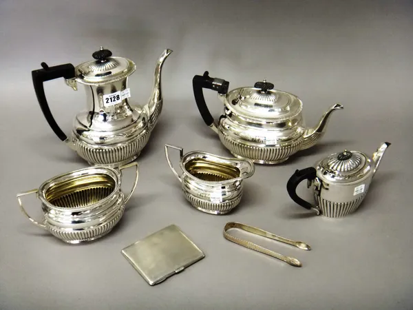 A plated four piece tea and coffee set, comprising; a teapot, a coffee pot, a twin handled sugar bowl and a milk jug, each piece of oval form, with pa