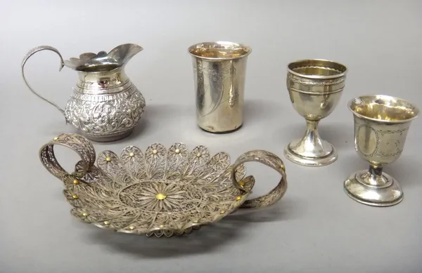 Foreign wares, comprising; a beaker engraved Maurice, detailed 800, two egg cups, including one detailed 800, a milk jug, possibly Indian and a filigr