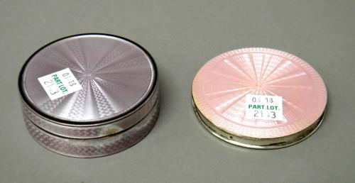 A European pale lilac and black enamelled circular box and cover, with guilloche enamelled decoration to the cover and to the base and a lady's silver