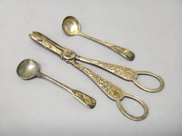 Silver, comprising; a pair of late Victorian grape scissors, having cast decoration, London 1899, an Old English pattern mustard ladle, probably Londo