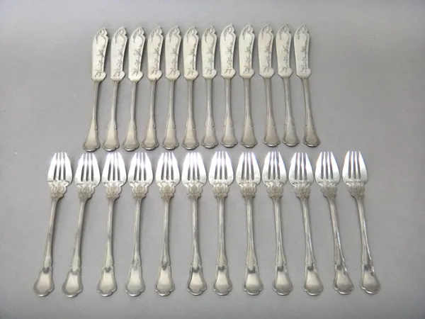 A set of twelve pairs of foreign fish knives and forks, with engraved decoration, detailed 800, combined weight 1225 gms.