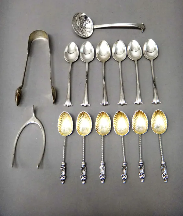 Silver, comprising; a pair of fiddle pattern sugar tongs, London 1866, a pair of sprung sugar nips, formed as a wishbone, Birmingham 1906, a sugar sif