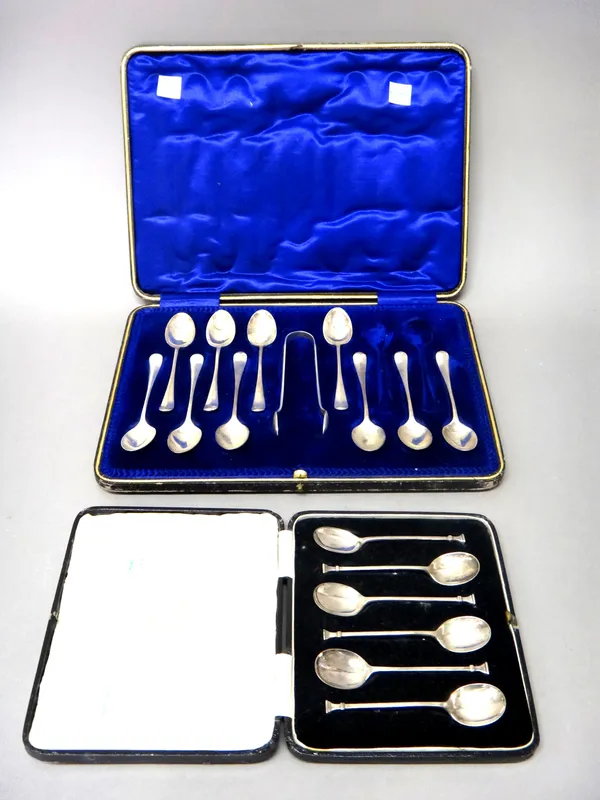 Silver flatware, comprising; a set of six coffee spoons, Birmingham 1931, with a case and a part set of ten rat tail pattern coffee spoons, Sheffield