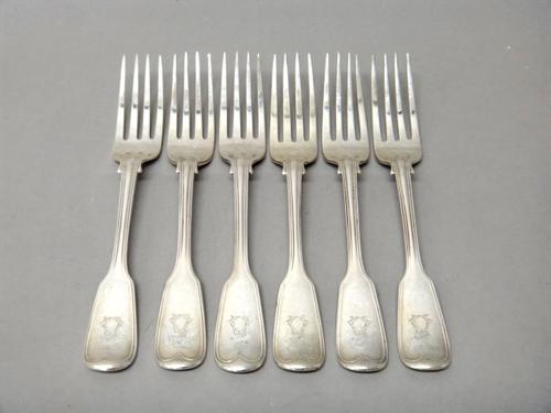 Six Victorian double struck, fiddle and thread pattern table forks, comprising; all London, two 1856, one 1857, one 1851 and two 1876, combined weight