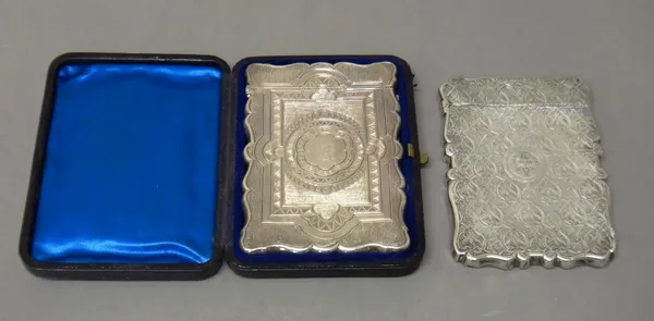 Silver, comprising; a Victorian shaped rectangular visiting card case, with engraved and engine turned decoration, Birmingham 1853, with a leather cas