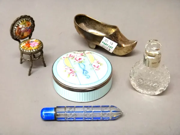 A silver gilt and enamelled circular hinge lidded box, decorated with pink flowers and with blue ribbons, import mark, London 1913, a silver model of