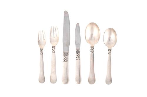 A Georg Jensen 'Nordic (Ladby) Pattern' silver part table service, designed by Oscar Gundlach-Pedersen, comprising; three table spoons, three dessert