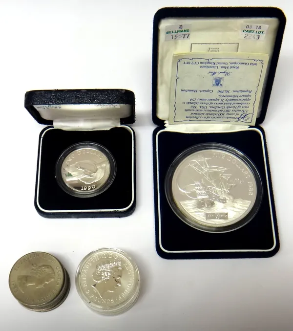 A Bermuda silver proof five dollar five ounce coin, 1988, with a certificate and a case, a Bermuda silver proof two dollar coin 1990, with a case, six