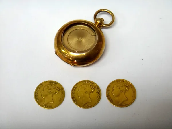 Three Victoria young head shield back half sovereigns, 1846, 1853 and 1871 and a gilt metal sovereign case, the front fitted with a glazed panel. (4)